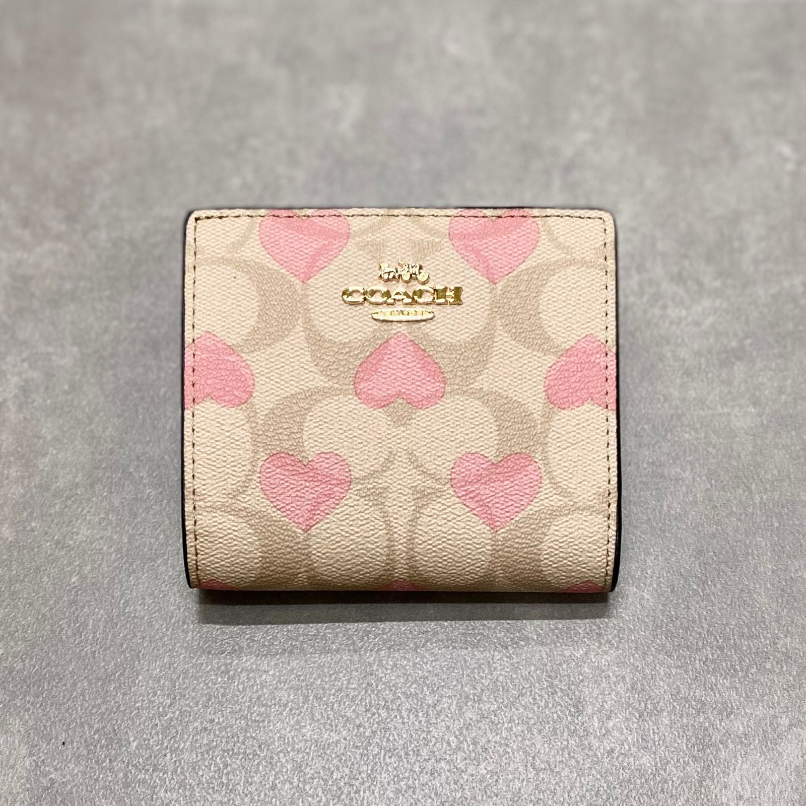 Ví Coach Women's Folding Short Wallet with Heart In Signature Canvas DS Beige -